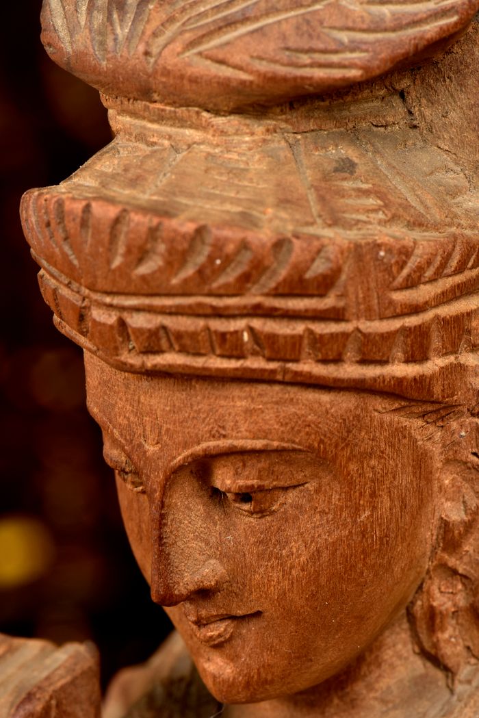 gallery-1 Detailed close-up of a traditional Indian wooden sculpture, showcasing intricate craftsmanship.